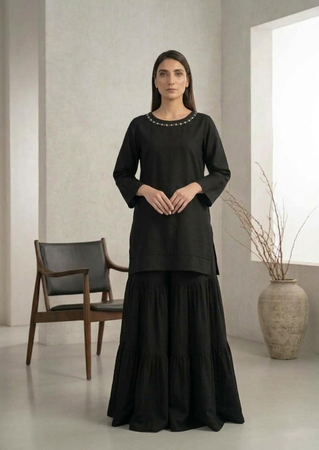 Bayashma black kurta with embellished neckline and matching tiered skirt