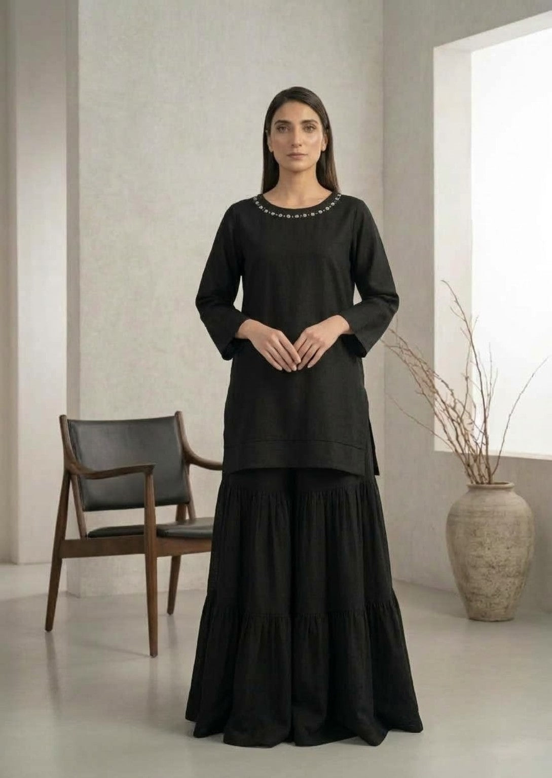 Bayashma black kurta with embellished neckline and matching tiered skirt